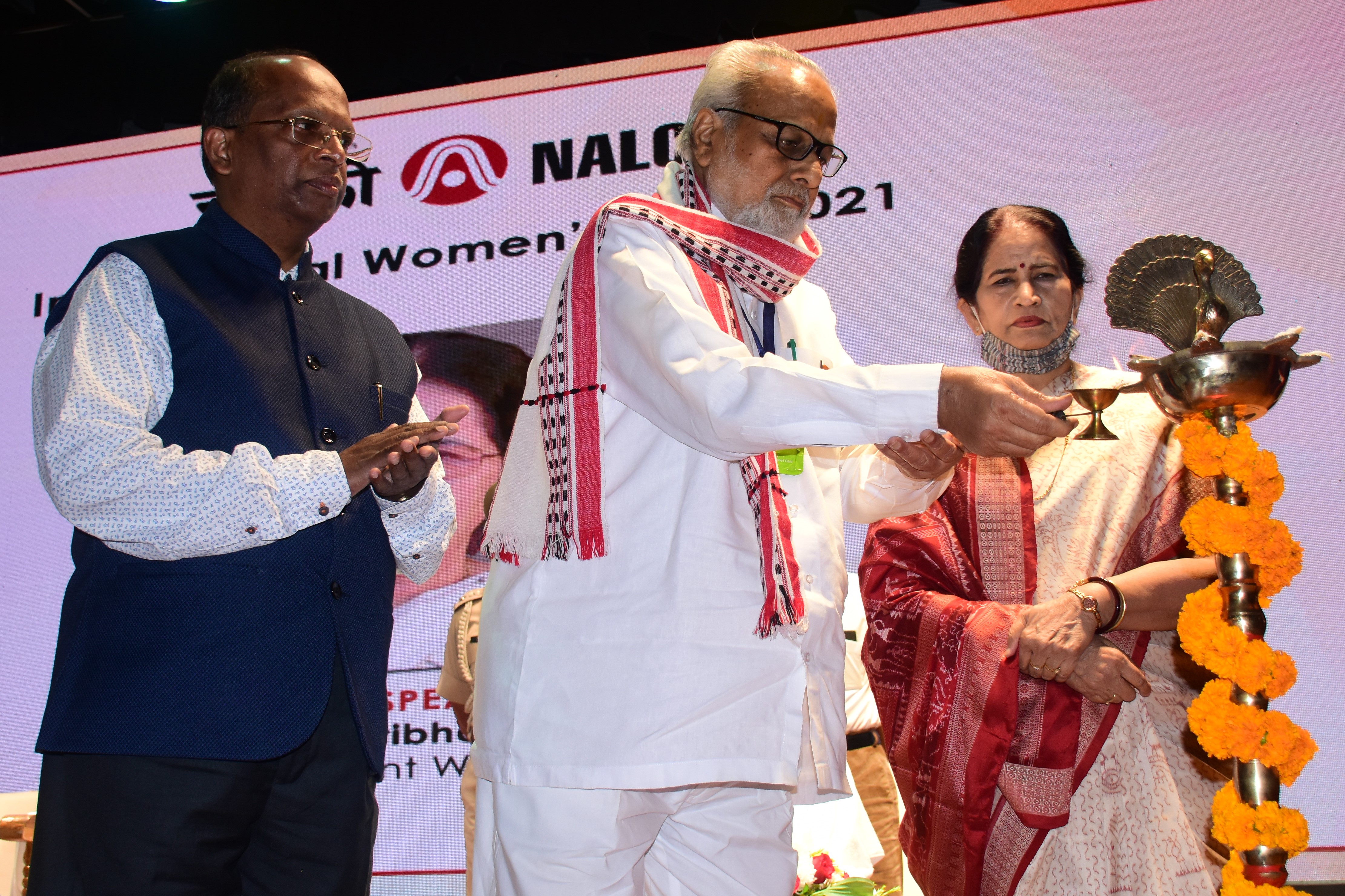 Hon’ble  Governor Prof. Ganeshi Lal with Padmashree Pratibha  Ray and CMD ,NALCO Sridhar Patra in International Women’s Day Celebrations organized by NALCO  in NALCO Research and Training Centre Bhubaneswar on 08.03.2021.