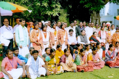 Governor and First Lady with members of tribal  community at Raj Bhavan